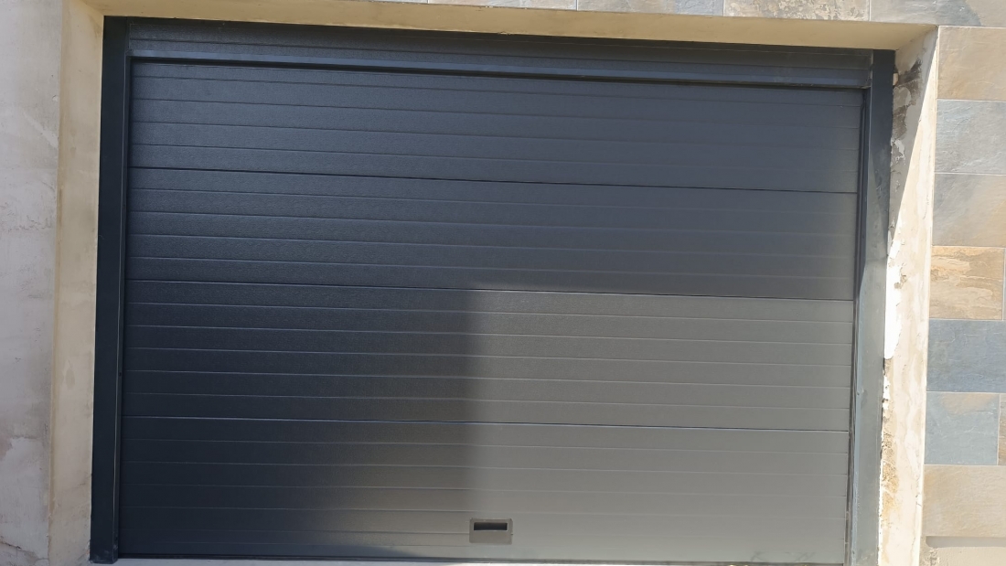 RESIDENCIAL - Puerta seccional automática 14